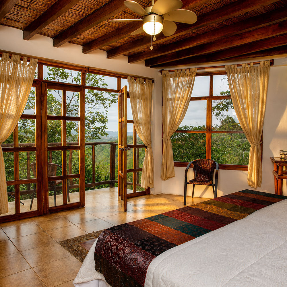 Ocean View Room with large windows overlooking Ecuador’s Pacific coast